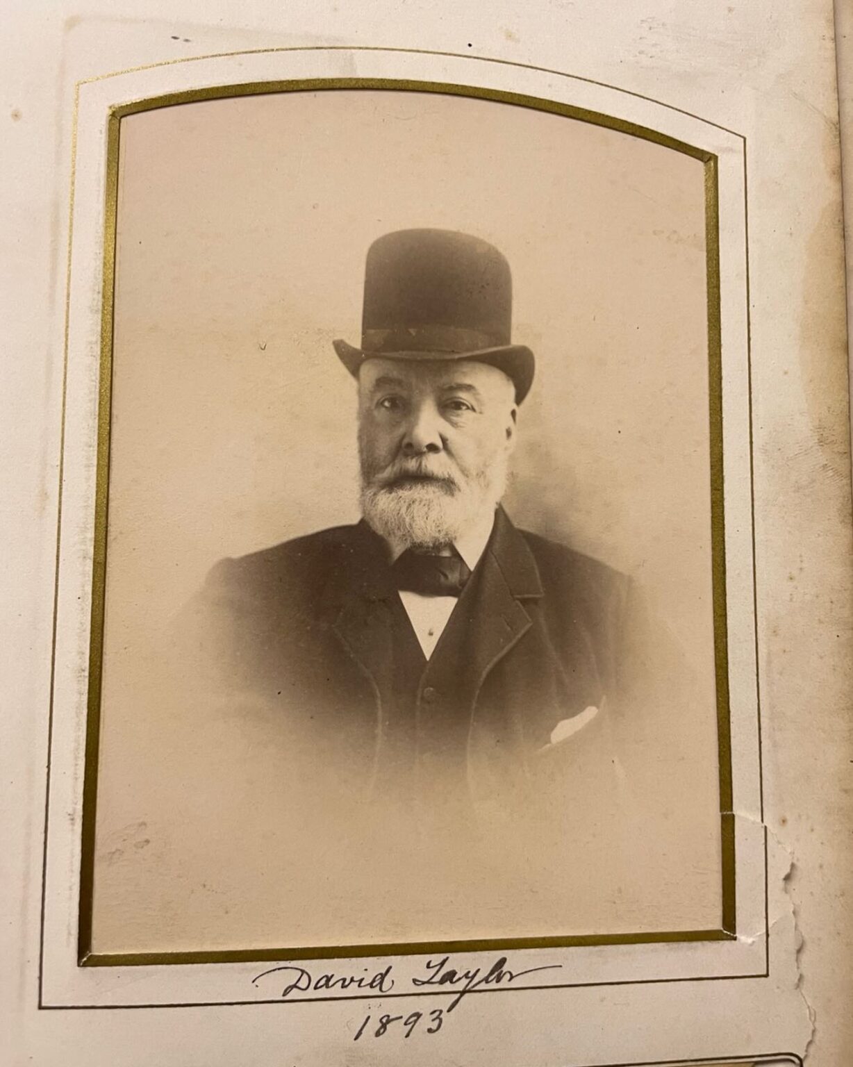 Sepia portrait of David Taylor in a bowler hat